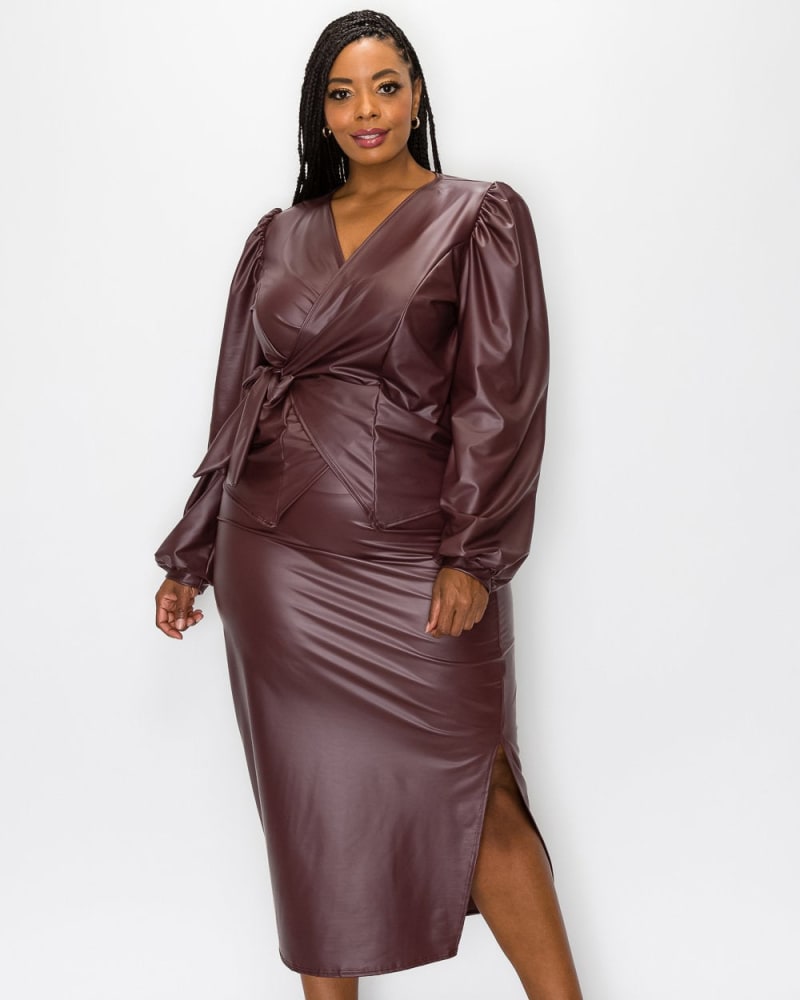 Front of a model wearing a size 3X Faux Leather Wrap Top and Slit Skirt Set in Burgundy Faux Leather by L I V D. | dia_product_style_image_id:240252